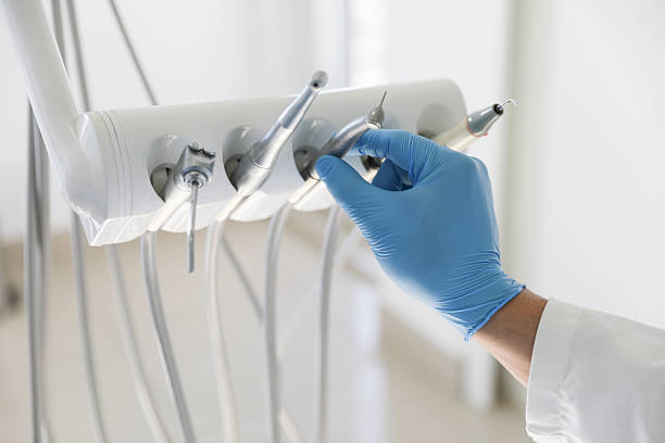 Professional Tooth Extraction technician working in Bayonne, NJ